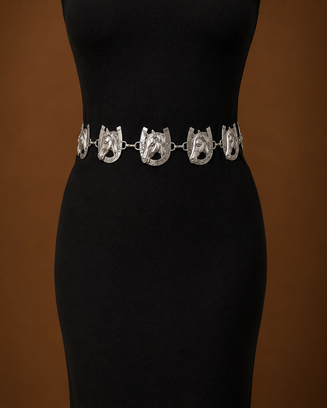Horse shoe belt with horse head conchos on black dress