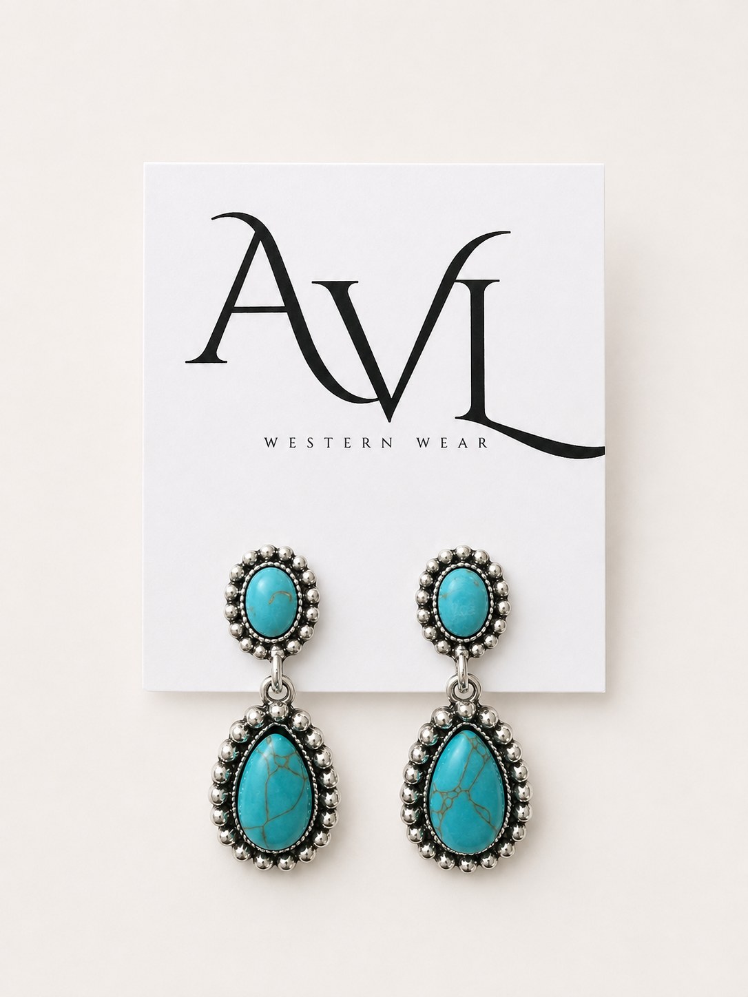 Vintage drop turquoise earrings on AVL card